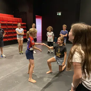 kids performing on stage