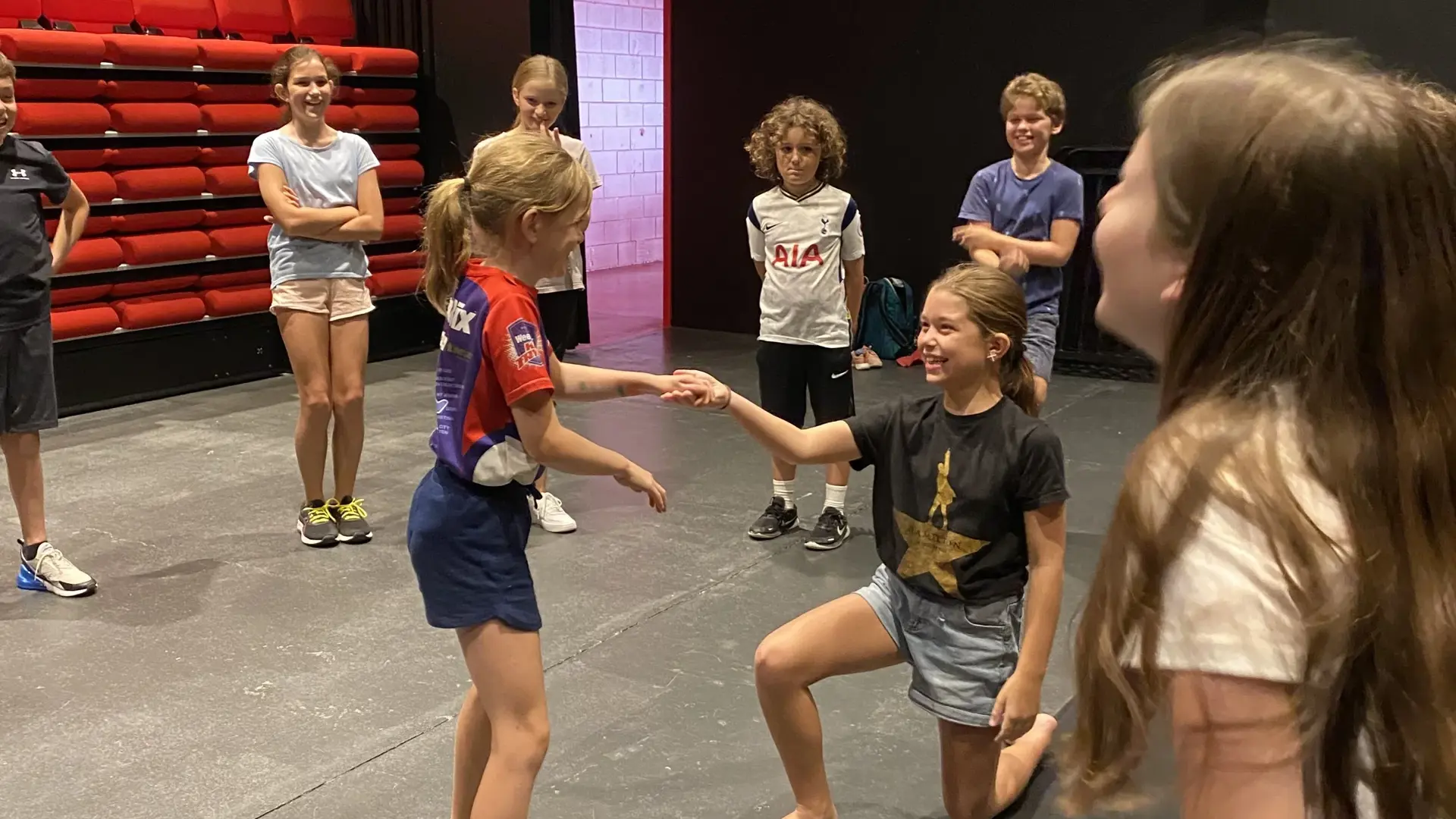 kids performing on stage