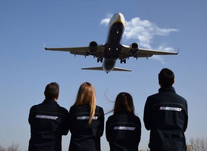 Mainfreight staff looking at plane